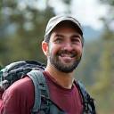 Founder of Vector Treks smiling in hiking gear